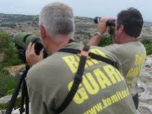 Volunteers keep watch to ensure hunters are not shooting or trapping birds flying over Malta