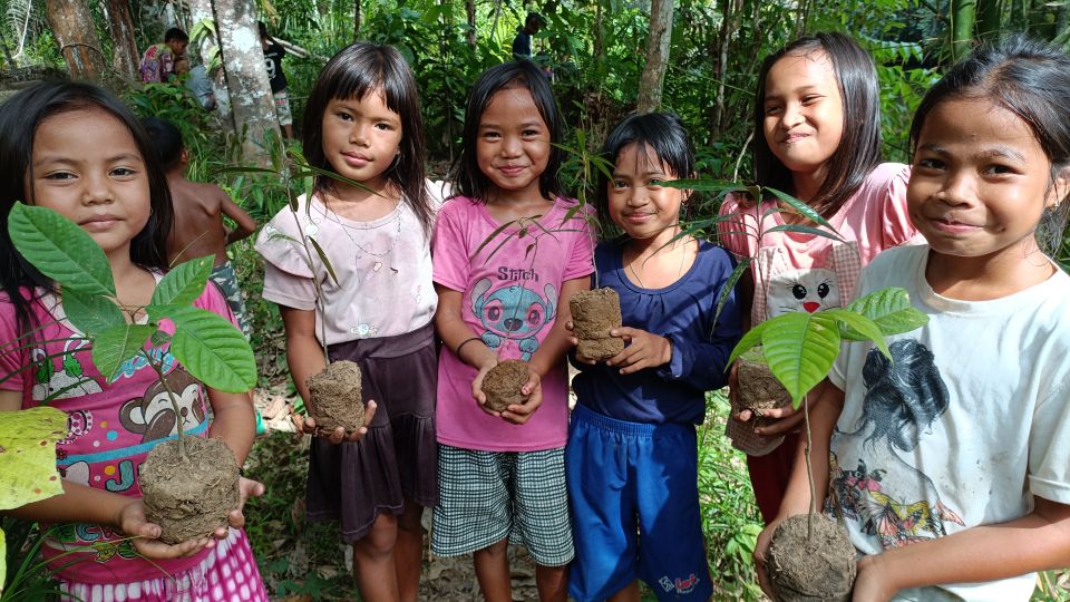 children planting trees