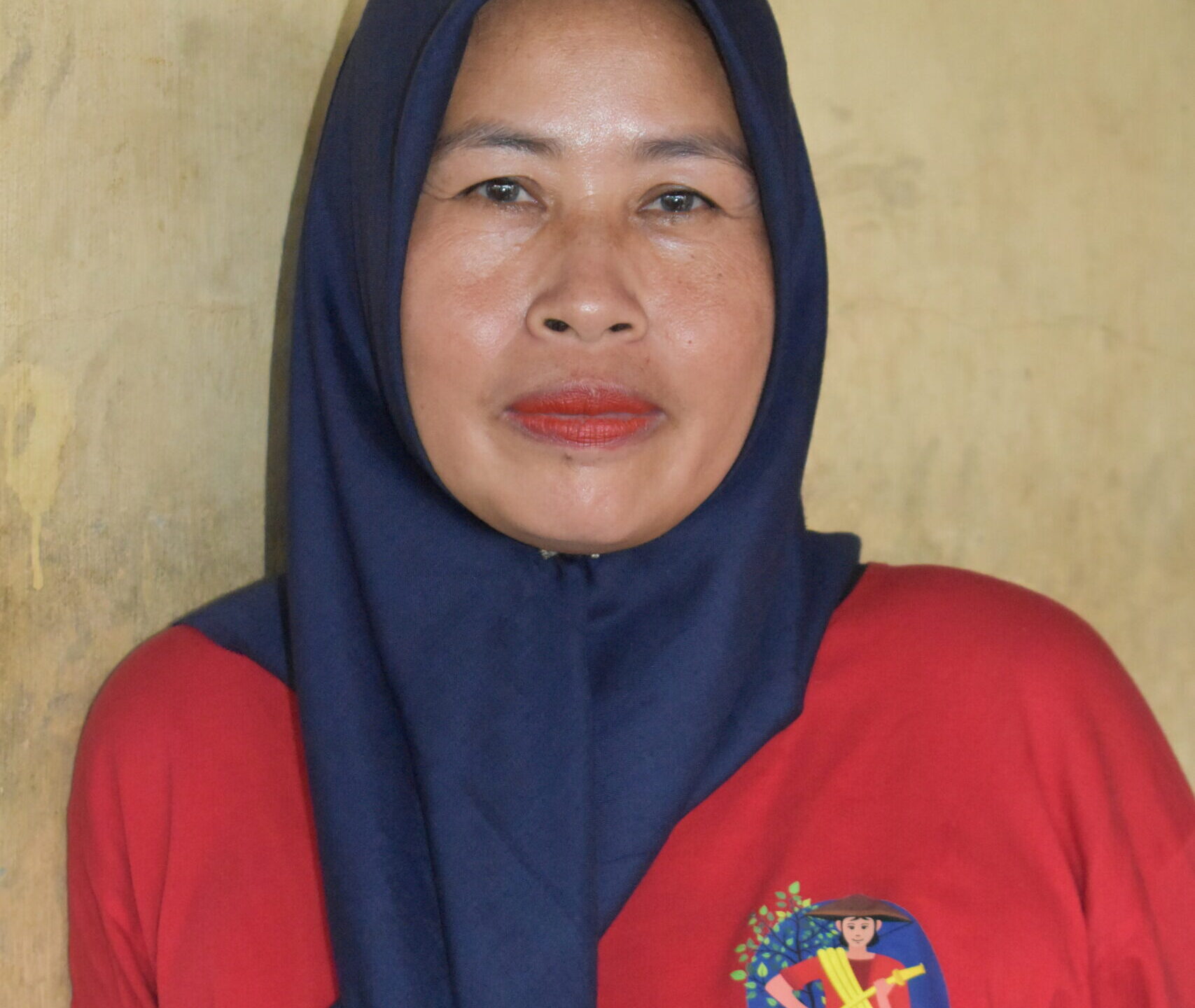 Woman in a Power of Mama red T Shirt